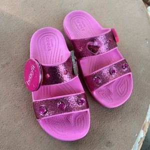 Benefit x Crocs collaboration jelly croc sandal